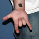 Image for article titled 12 Idiots With Hideous and Stupid Apple Tattoos